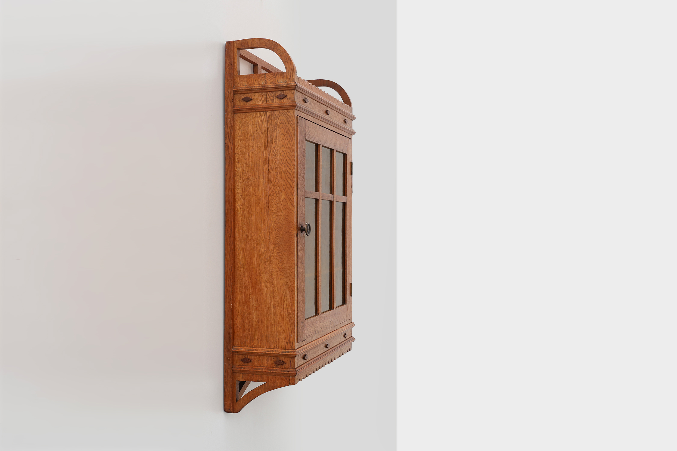 Art Deco oak wall cabinet with amber glazed door, Belgium ca. 1925thumbnail